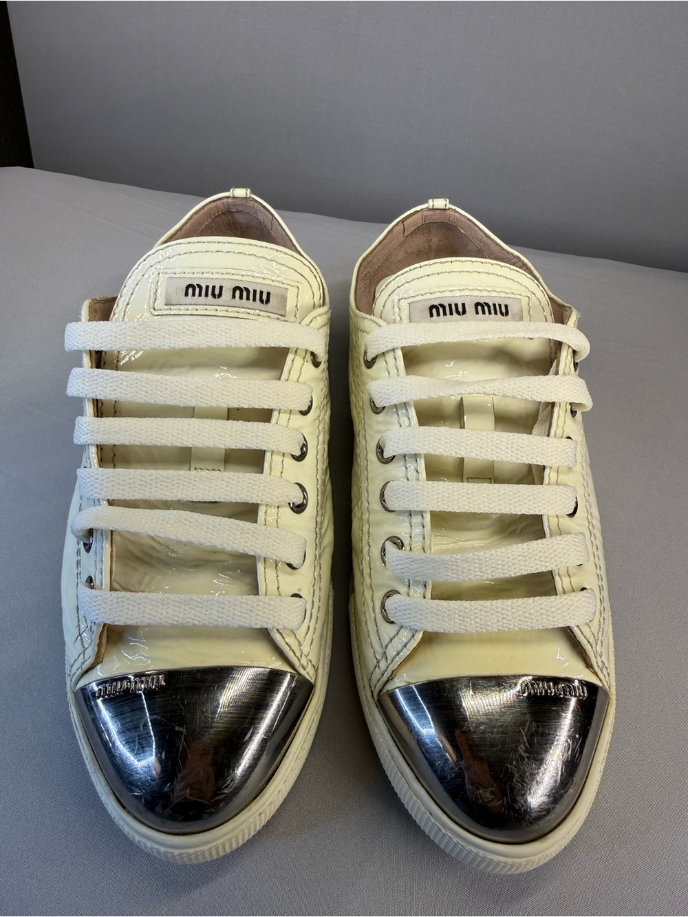 Miu Miu Cream Patent Leather Sneakers with Silver Toe Caps